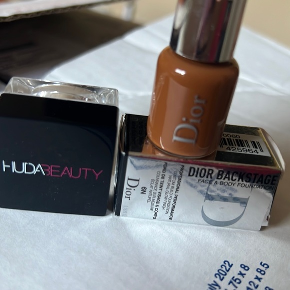 Dior Other - Dior face and body backstage foundation and Huda beauty face powder.